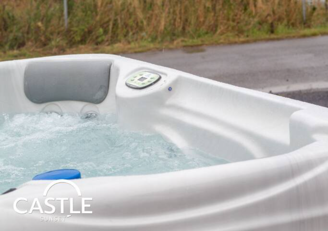 Close-up of the bubbling private hot tub at Castle Sunset on the Beach, Cayton Bay